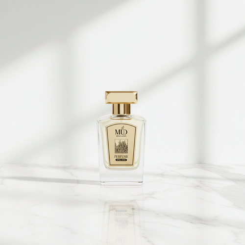 MUD Musk & Oud gold perfume bottle on marble background