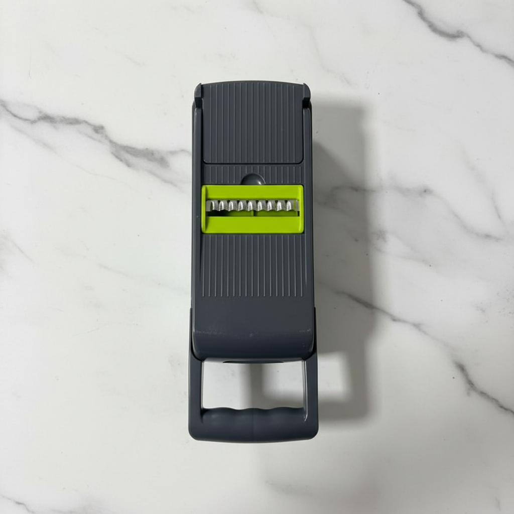 16-piece veggie slicer mandoline top view — professional studio shot